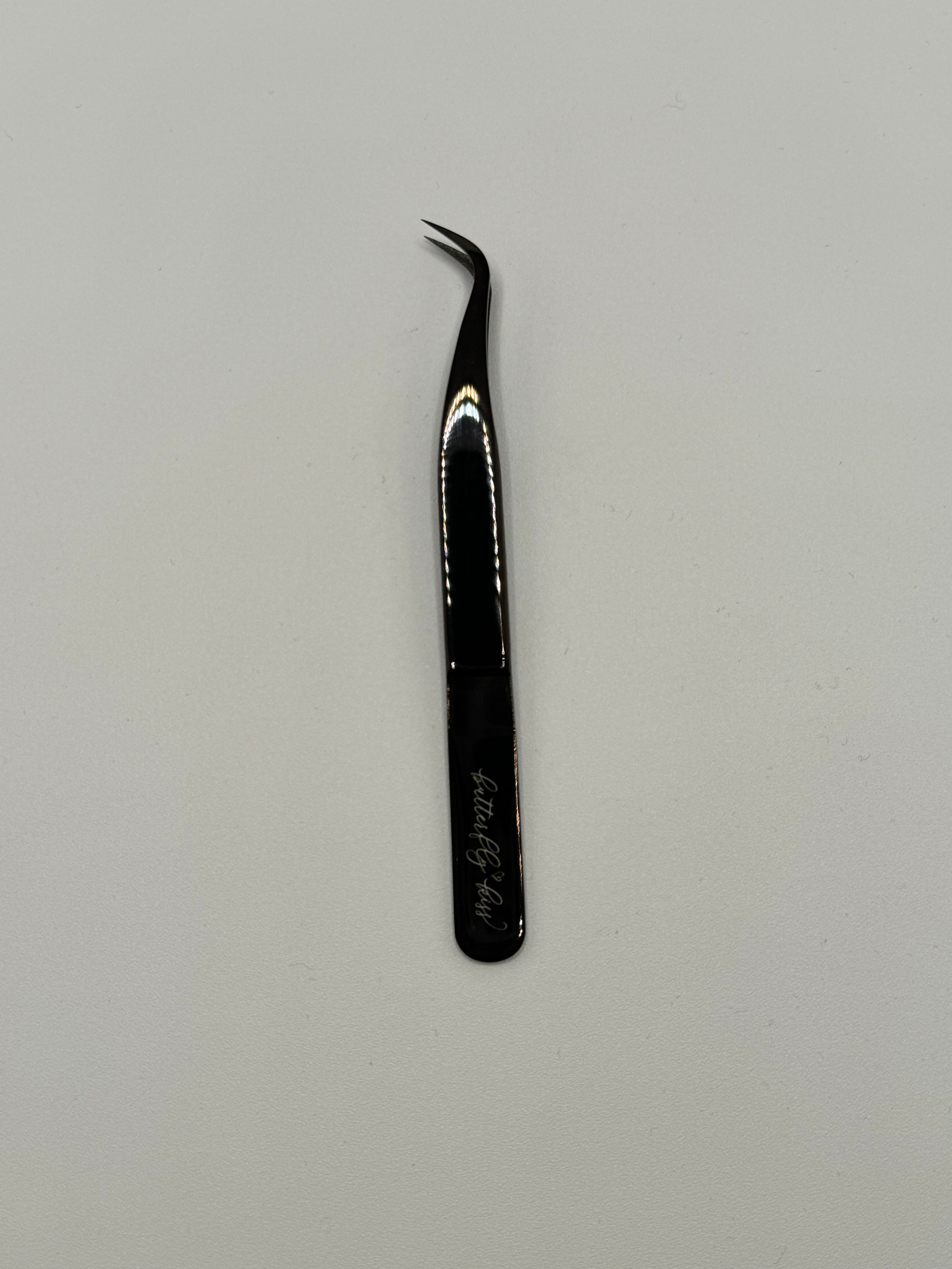 curved volume tweezer